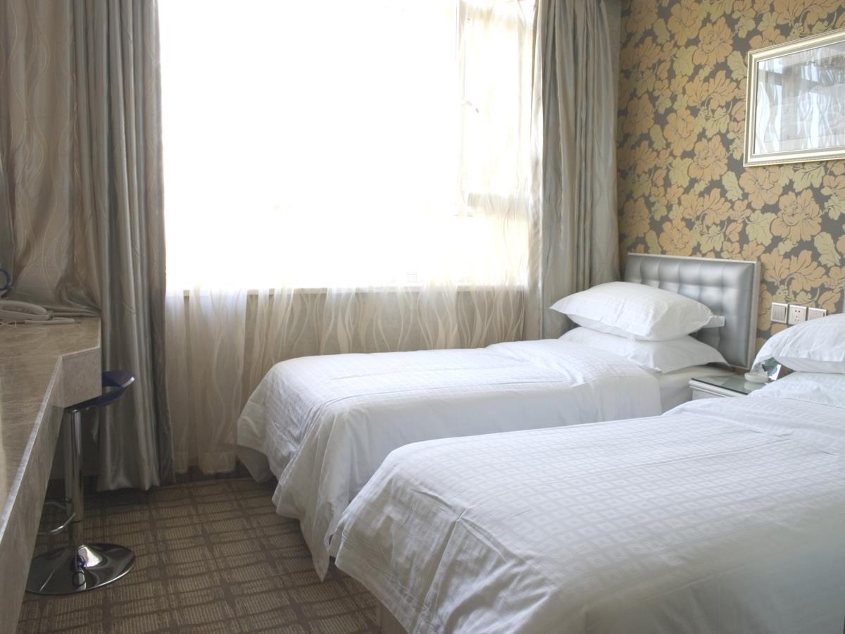 Xinyijia City Hotel อุรุมชี ภายนอก รูปภาพ